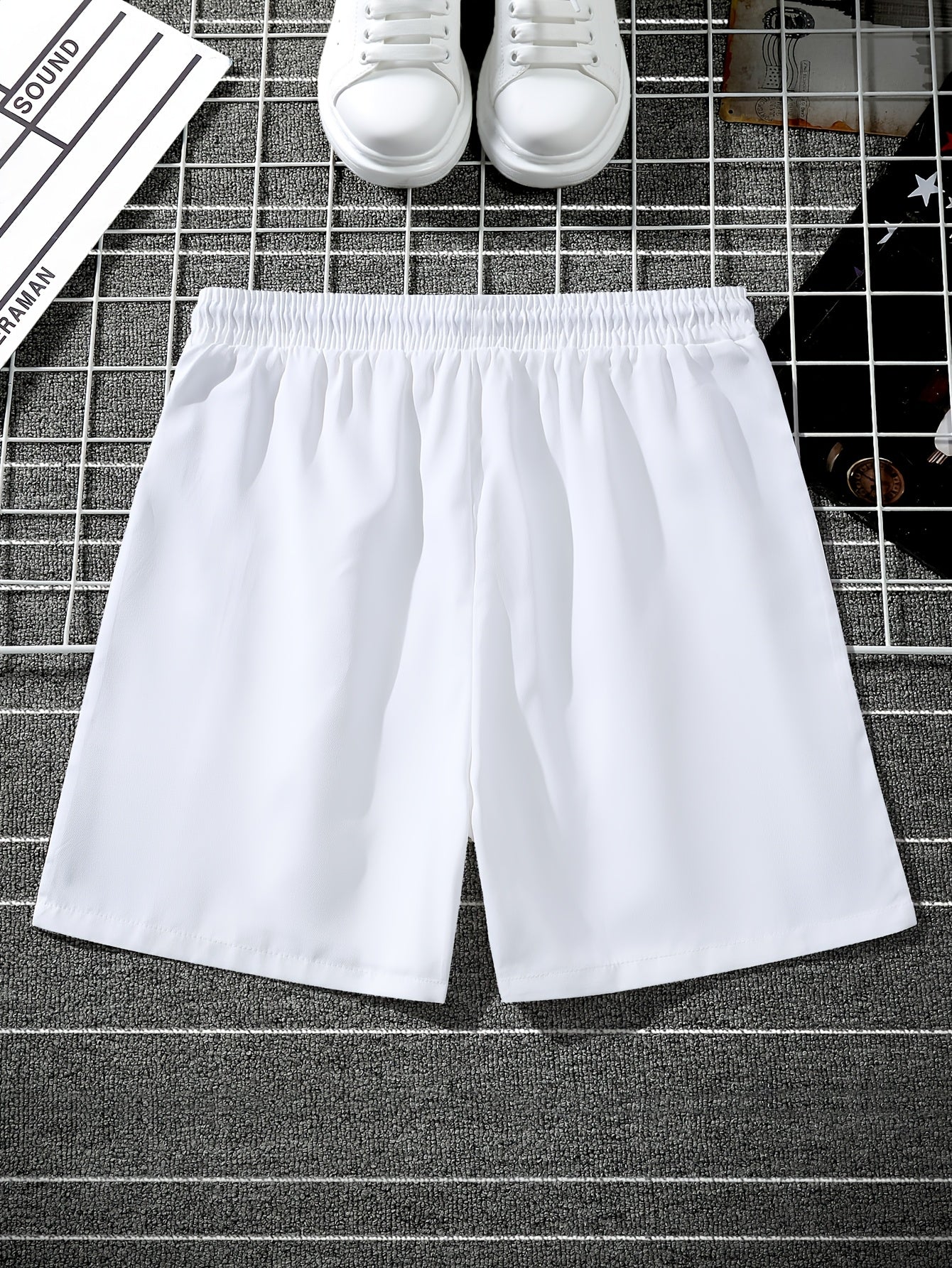 Herren Urban Streetwear Shorts mit grafischem Muster und elastischem Bund – Modische Freizeithose