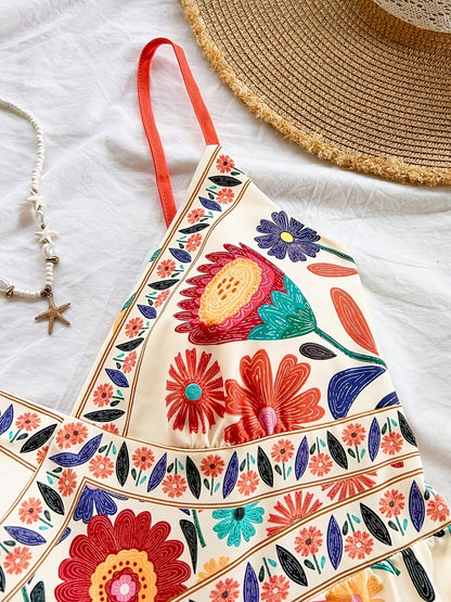 Damen Jumpsuit mit Blumenmuster und Spaghettiträgern – Verspielter Einteiler für Freizeit und Urlaub