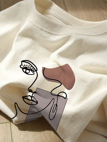Damen T-Shirt mit abstraktem Gesicht Print – Modernes Casual Design für Alltag und Freizeit