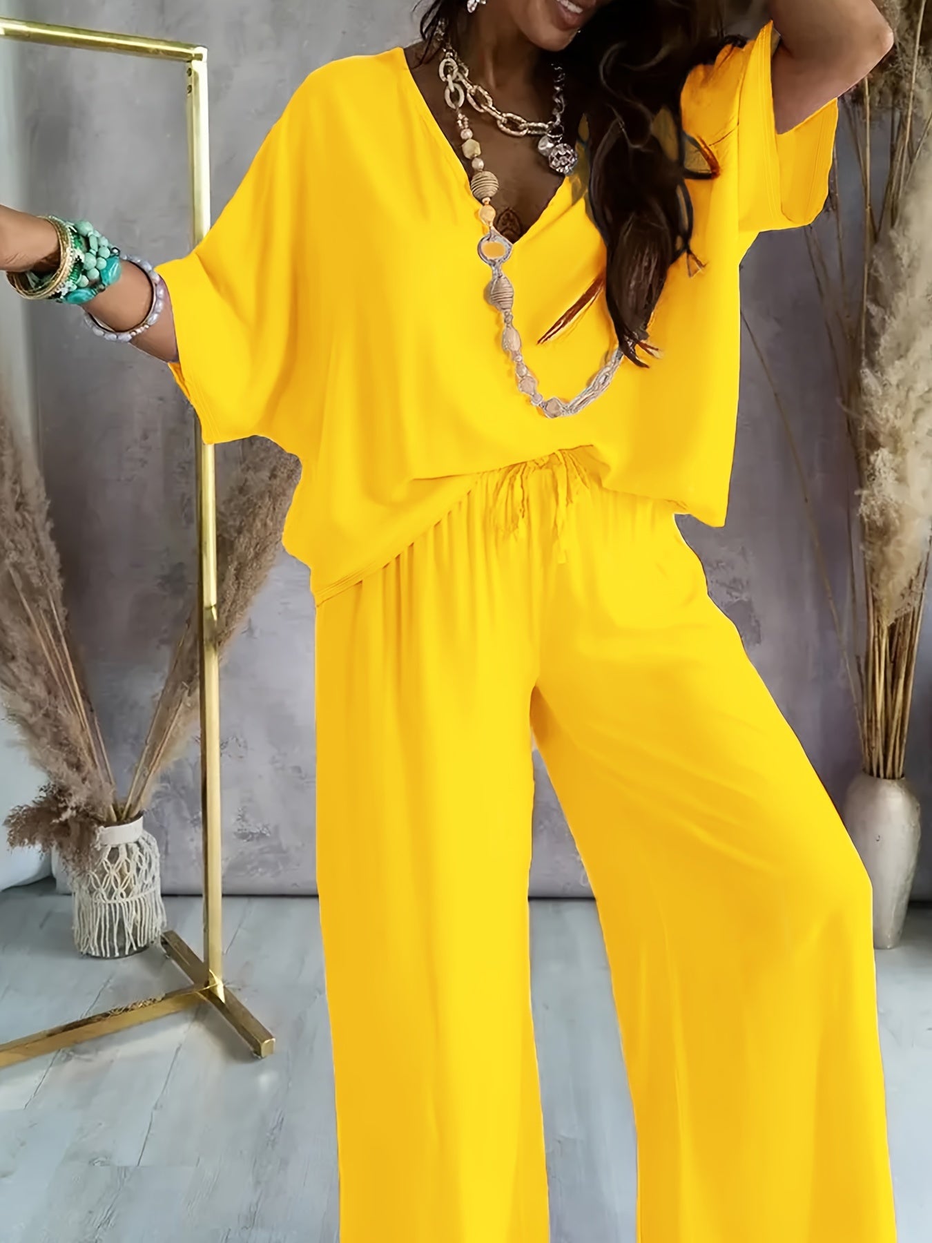 Damen Eleganter Einteiler Jumpsuit mit Weitem Bein und V-Ausschnitt – Modisch für Alltag und Freizeit