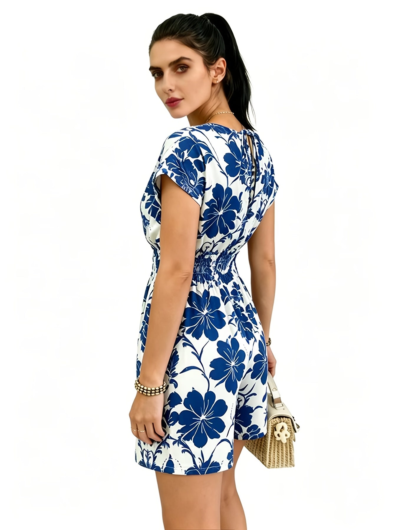 Damen Jumpsuit mit V-Ausschnitt und tropischem Print – Eleganter Freizeit Einteiler mit Taillenbetonung