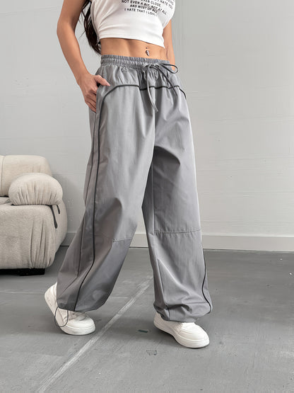 Damen Weite Streetwear Jogginghose mit Paspelierung – Urbaner Freizeitstil