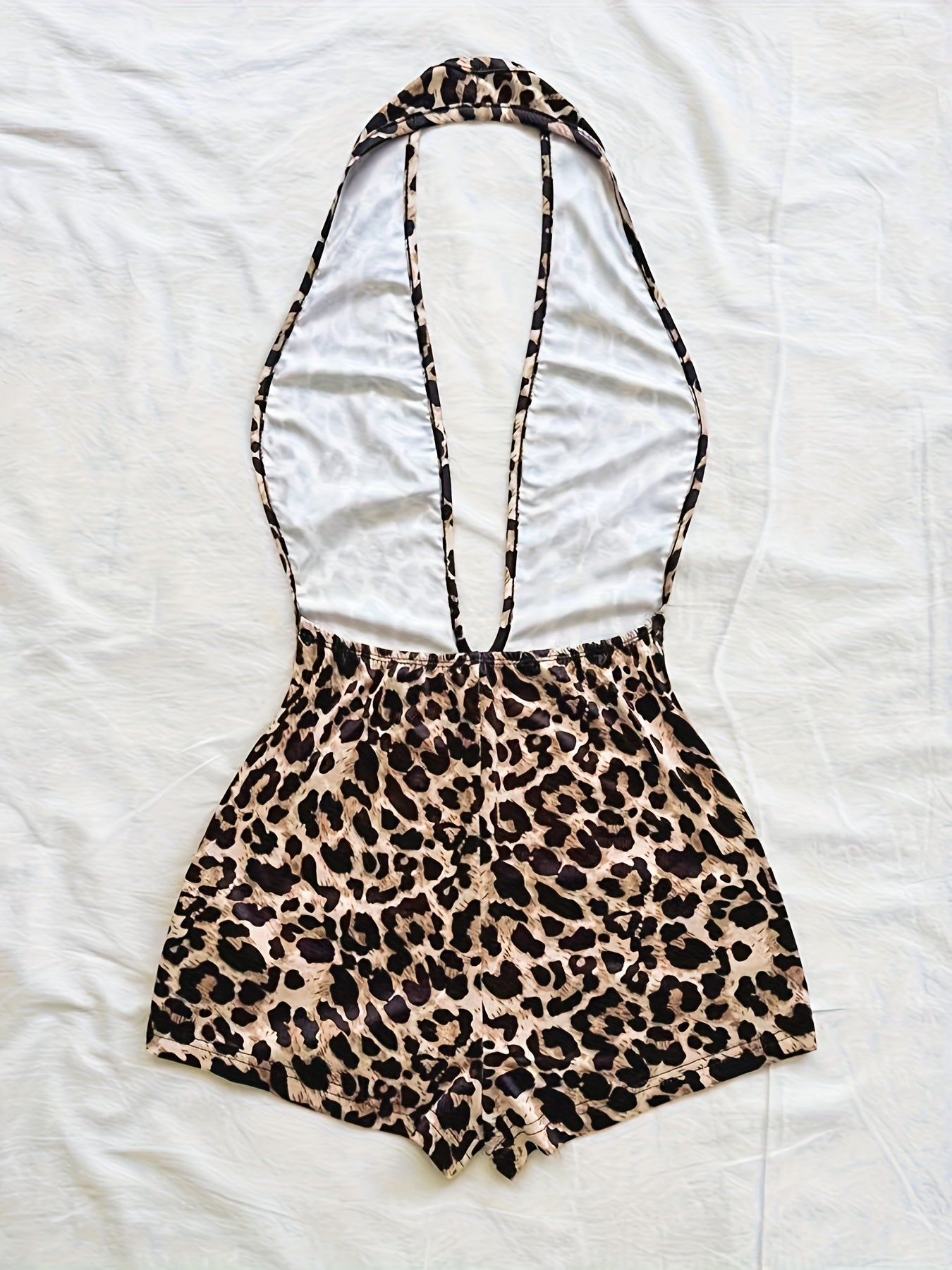 Damen Jumpsuit mit tiefem Ausschnitt und Animalprint – Trendiger Einteiler für Party, Strand & Urlaub