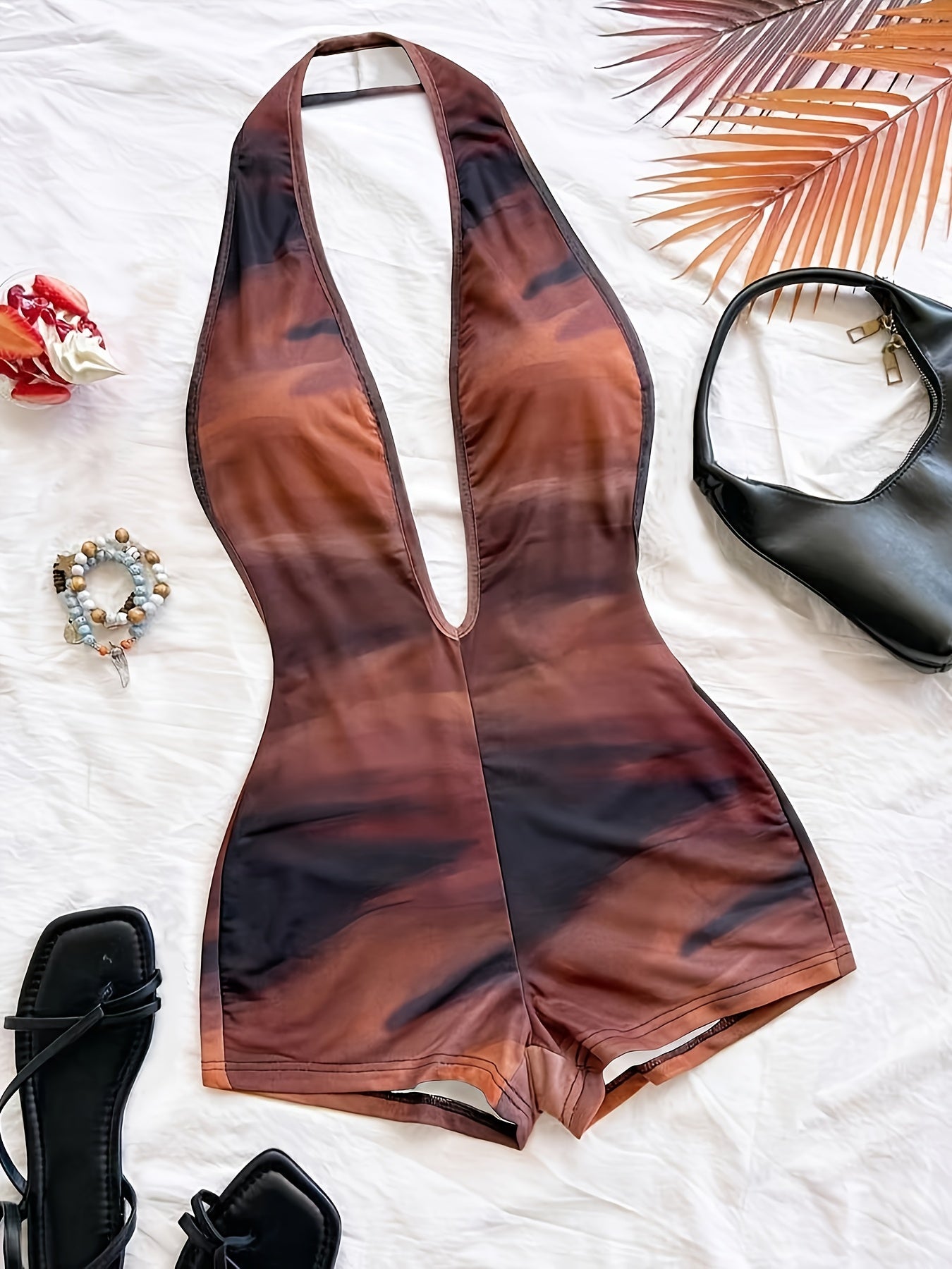 Damen Jumpsuit mit tiefem Ausschnitt und Animalprint – Trendiger Einteiler für Party, Strand & Urlaub