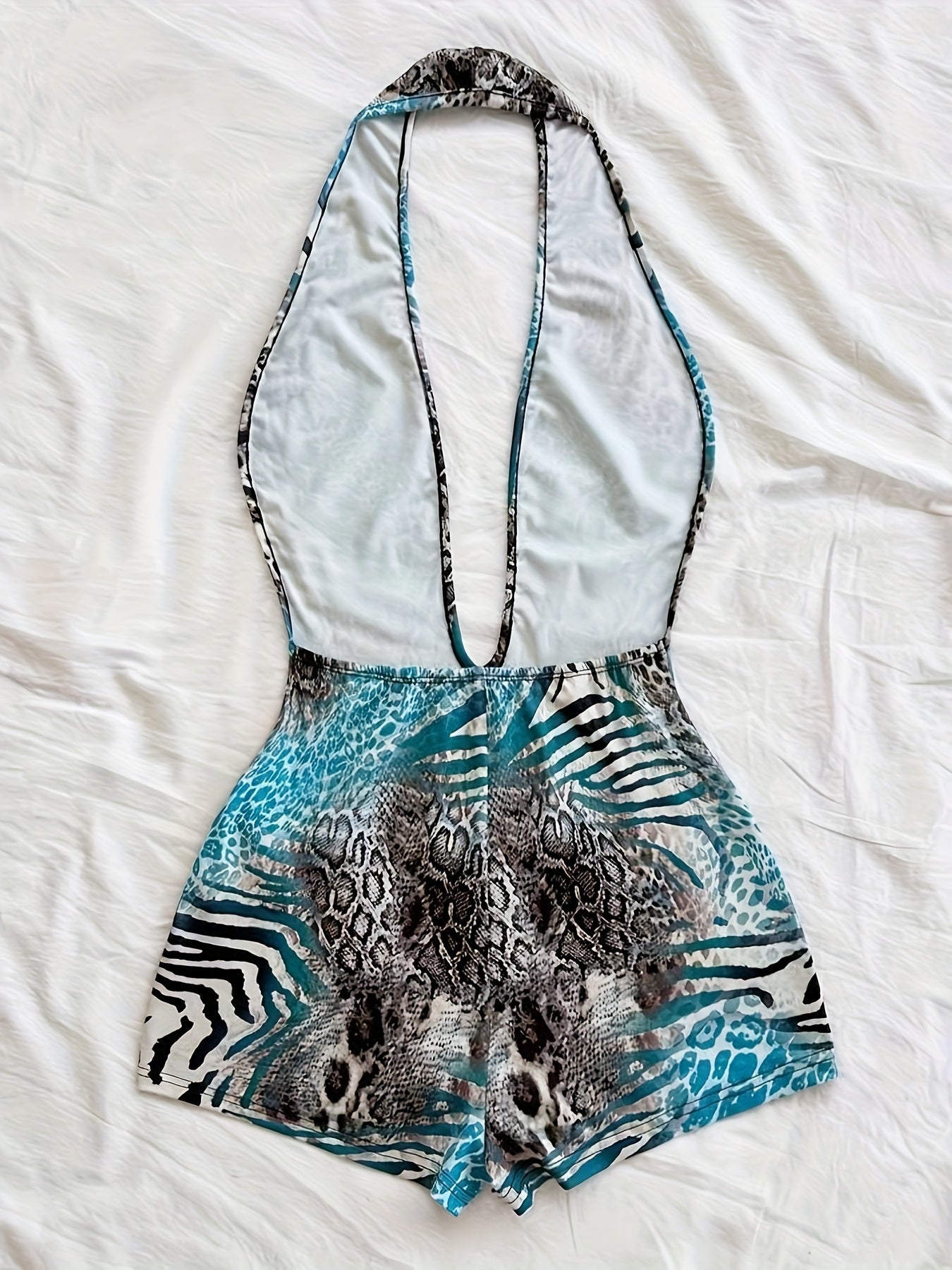 Damen Jumpsuit mit tiefem Ausschnitt und Animalprint – Trendiger Einteiler für Party, Strand & Urlaub