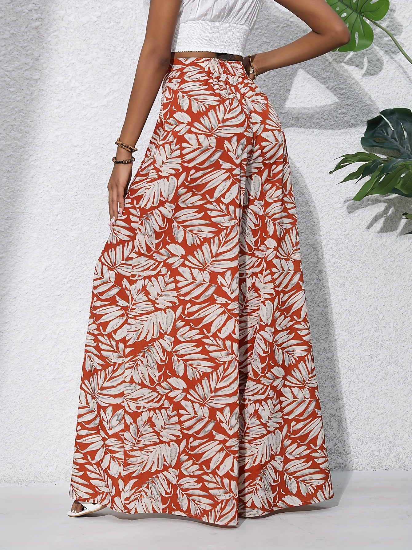 Damen Weite Palazzo-Hose mit tropischem Blattmuster – Sommerlich, Boho, Ideal für Strand & Freizeit