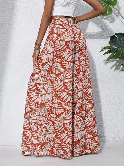 Damen Weite Palazzo-Hose mit tropischem Blattmuster – Sommerlich, Boho, Ideal für Strand & Freizeit