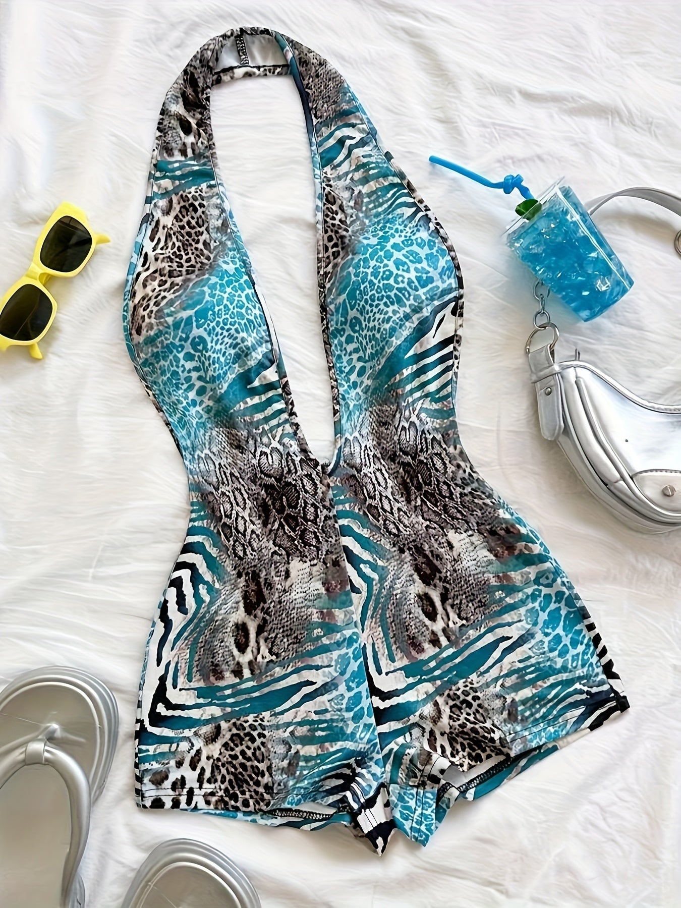 Damen Jumpsuit mit tiefem Ausschnitt und Animalprint – Trendiger Einteiler für Party, Strand & Urlaub