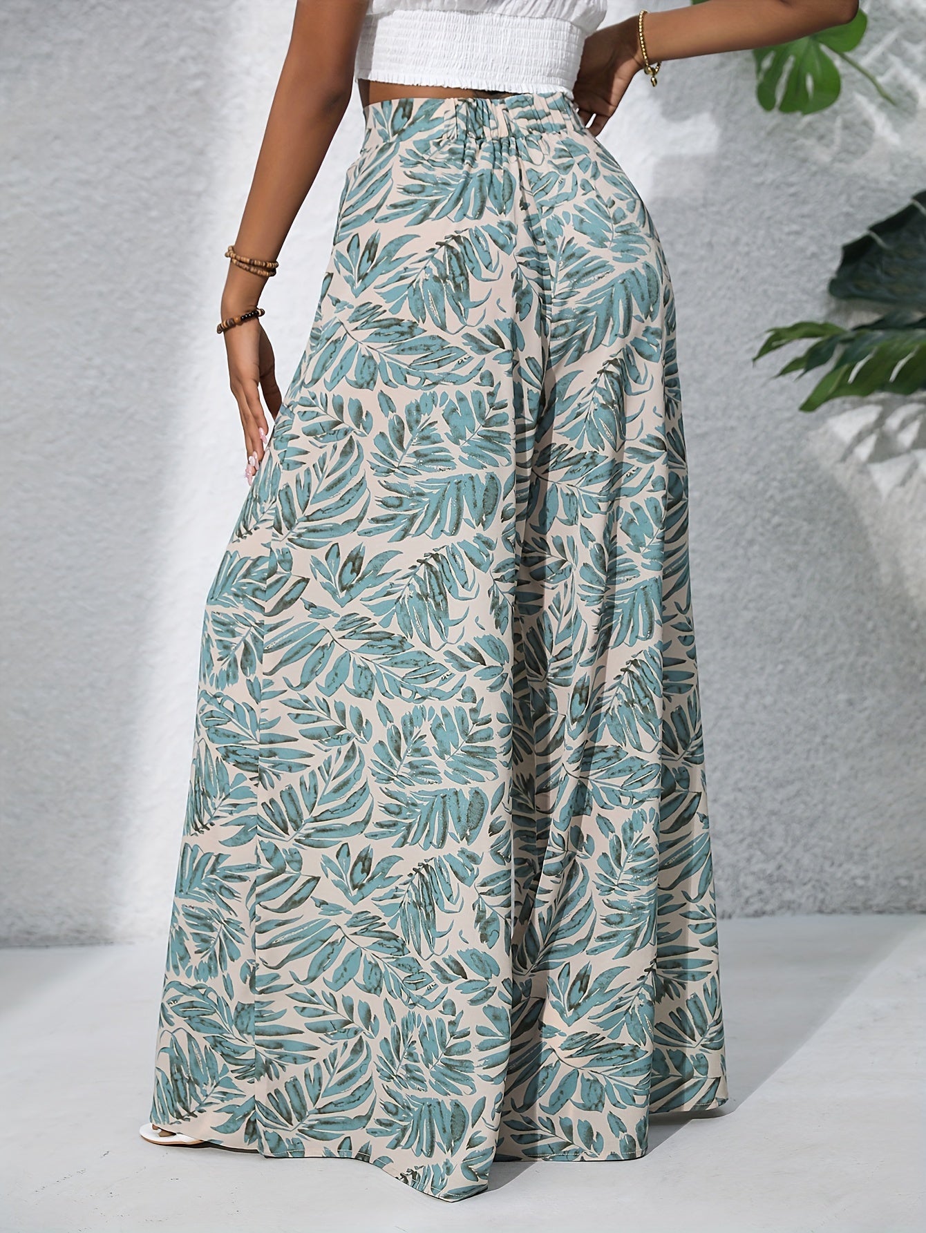 Damen Weite Palazzo-Hose mit tropischem Blattmuster – Sommerlich, Boho, Ideal für Strand & Freizeit