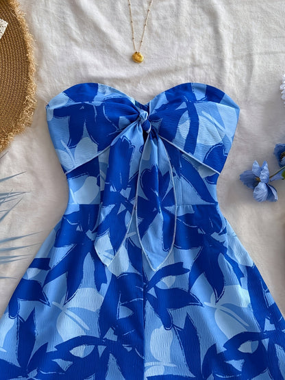 Damen Bandeau-Jumpsuit mit Blumenmuster und Schleifendetail – Eleganter Einteiler für Urlaub und Sommer-Outfits
