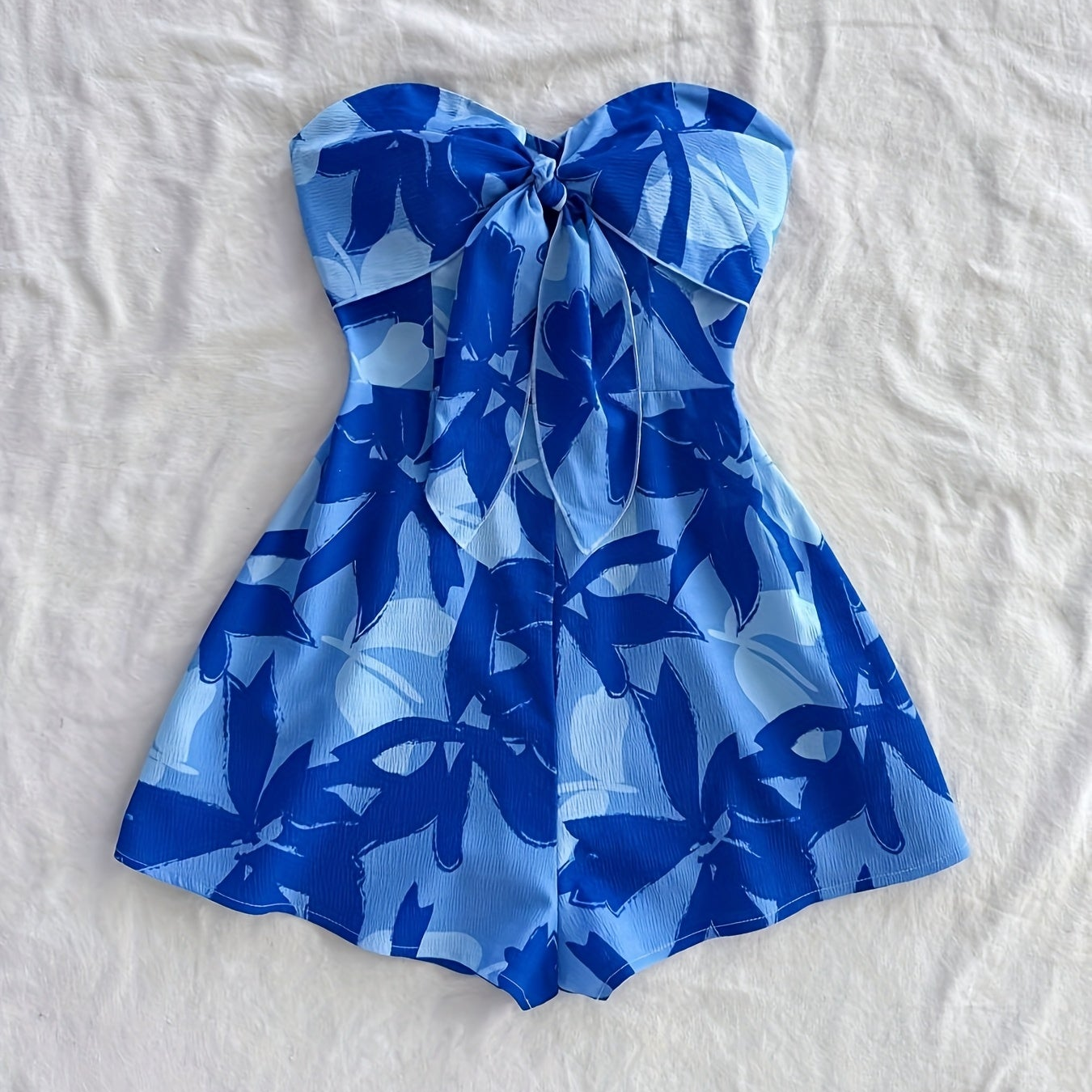 Damen Bandeau-Jumpsuit mit Blumenmuster und Schleifendetail – Eleganter Einteiler für Urlaub und Sommer-Outfits